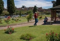 People in masks and without in rose garden in Rome during second year of coronavirus epidemic covid-19, Italy