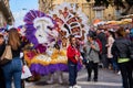Annual Mardi Gras Fat Tuesday grand parade on maltese street of allegorical floats and masquerader procession Royalty Free Stock Photo