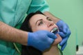 People, medicine, stomatology and health care concept - close up of dentists and assistant with mirror Royalty Free Stock Photo