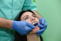 People, medicine, stomatology and health care concept - close up of dentists and assistant with mirror