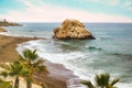 People at the mediteranean beach on a hazy day Royalty Free Stock Photo