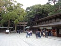 People at Meiji-jingu Shrine, conblock groud, wooden pillar, greenery and cloudy sky, Tokyo 2016