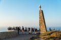 People at the monument marking Cabo da Roca as the westernmost e