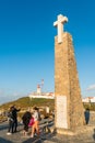 People at the monument marking Cabo da Roca as the westernmost e