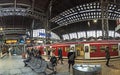 People in the morning wait for the train in the central station