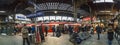 People in the morning wait for the train in the central station