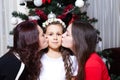 People, motherhood, family, christmas and adoption concept - happy mother and daughter hugging at home Royalty Free Stock Photo