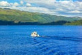 People on the motor boat at the Loch Lomond lake in Scotland, 21 July, 2016 Royalty Free Stock Photo