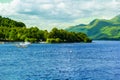 People on the motor boat at the Loch Lomond lake in Scotland, 21 July, 2016 Royalty Free Stock Photo