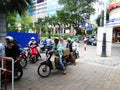 People with motorcycle queuing up to enter Royalty Free Stock Photo