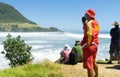 People on Moturiki watching big surf Royalty Free Stock Photo