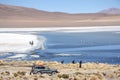 People at the mountain lake in Eduardo Avaroa Park Royalty Free Stock Photo