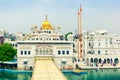 People move around `Amritsarovar` pool in main Sikh temple complex - Gurudwara Sri Harmandir Sahib in Amritsar