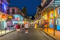 people on the move in the Burbon street at night in the French quarter