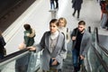 People moving up on escalator Royalty Free Stock Photo