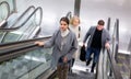 People moving up on escalator Royalty Free Stock Photo