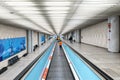 People on the moving walkway in the Palma International Airport