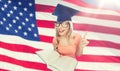 Student woman in mortarboard with encyclopedia Royalty Free Stock Photo