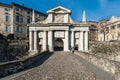 People near city gates of San Marco in Bergamo town, Italy. Royalty Free Stock Photo