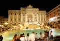 People near fountain Fontana di Trevi at night Royalty Free Stock Photo