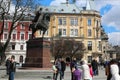 People near Monument to King Danil Galitsky in Lviv, Ukraine