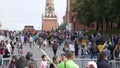 People near red square in summer