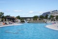 People near the swimming pool