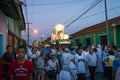 People at night in a procession in the streets of the city of Leon in Nicaragua during the Easter celebrations