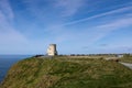 People at the O Brien tower at the Cliffs of Moher located at the southwestern edge of the Burren region in County Clare, Ireland Royalty Free Stock Photo