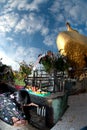 People offerings of candles for Kyaiktiyo Pagoda.Myanmar.