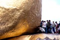 People offerings of gold for Kyaiktiyo Pagoda. Myanmar.