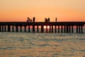 People On The Old Sea Pier During Sunset
