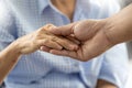 People old woman  and young hand care holding healthcare  Disabled walking with assistance Royalty Free Stock Photo