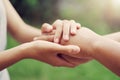 people old and young hand holding with sunlight. concept power of hope Royalty Free Stock Photo