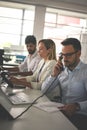 People in operations center talking on Landline phone. Operator Royalty Free Stock Photo