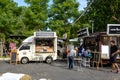 People order meal from food trucks at Food Truck Fair in Bangkok. Royalty Free Stock Photo