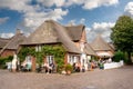 People on outdoor cafe terrace, Nieblum, Foehr island, North Frisia, Schleswig-Holstein, Germany Royalty Free Stock Photo