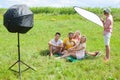 People outdoor shooting set up during photo session Royalty Free Stock Photo