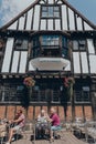 People at the outdoor tables of Gert and Henry`s restaurant in York, UK Royalty Free Stock Photo