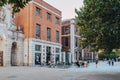 People at the outdoor tables of Paul`s cafe in Paternoster Square, City of London, UK Royalty Free Stock Photo