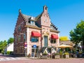 People on outdoor terrace of cafe in old town hall of Laren, Nor Royalty Free Stock Photo