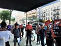 People outside B&H Photo store in Manhattan with signs Keep jobs in NYC in the hands protesting with union support.