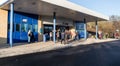 People outside park and ride bus terminal