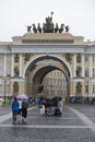 People on Palace Square with General Staff Building, Triumphal Arch and Chariot of Glory sculpture