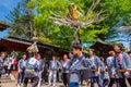 People parade through a street to Nezu-jinja shrine in Bunkyo Azalea Festival in Tokyo, japan