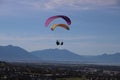 People paragliding at Salt Lake County Flight Park during the sunrise