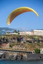 People paragliding tandem over the city. Tenerife, Canary Islands