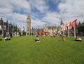 People in Parliament Square green in London