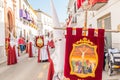 People participating in the Holy Week procession in a Spanish city during Easter