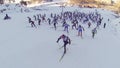 People participating in the mass ski race Ski Track of Russia during the competition. competition skiing, the crowd. a